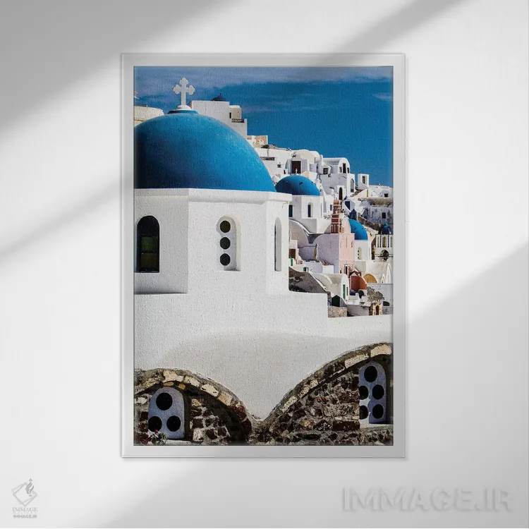 تابلو دکوراتیو Greece. Row of Greek Orthodox Churches with blue domes.,اویا… اثر جولی سیندا - نمای قابدار سفید