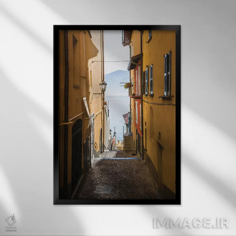 تابلو دکوراتیو Varenna, Italy,خیابان زرد منتهی به دریاچه کومو، وارنا، ای… اثر ماتئو کولومبو - نمای قابدار مشکی