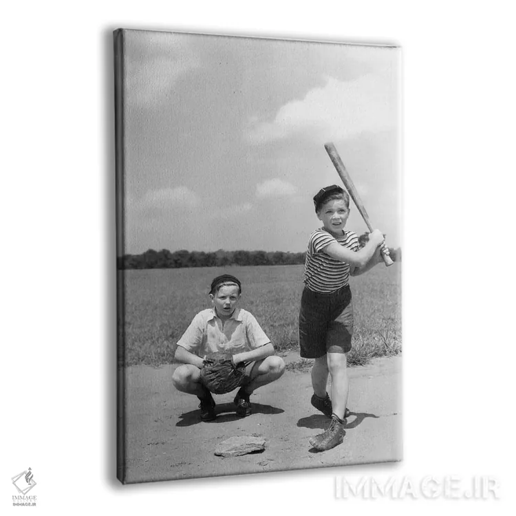 تابلو دکوراتیو دهه ۱۹۳۰ دو پسر نوجوان در نقش زننده و گیرنده در حال بازی ب… اثر تصاویر وینتج - نمای پرسپکتیو محصول