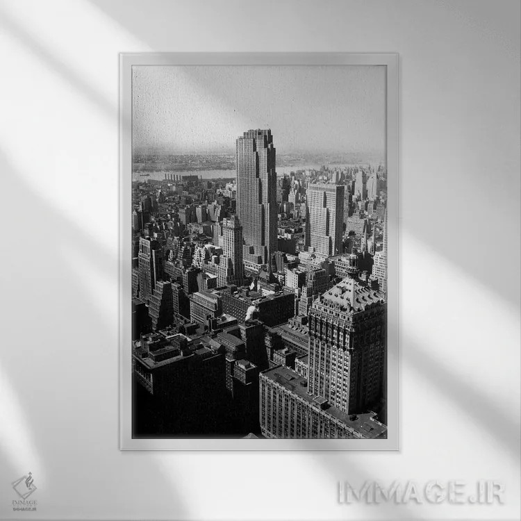 تابلو دکوراتیو نمای هوایی منهتن نیویورک، مرکز راکفلر و رادیو سیتی در مرکز… اثر تصاویر وینتج - نمای قابدار سفید