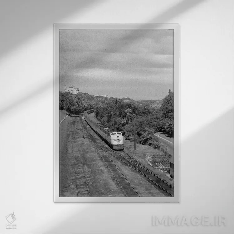 تابلو دکوراتیو نمای بالای لوکوموتیو دیزلی مسافری با کابین جلوی ایروباورامی… اثر تصاویر وینتج - نمای قابدار سفید