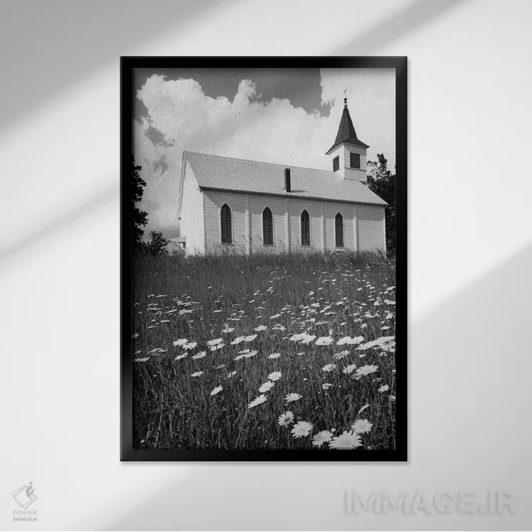 تابلو دکوراتیو کلیسای روستایی در میان مزرعه گل بابونه اثر تصاویر وینتج - نمای قابدار مشکی