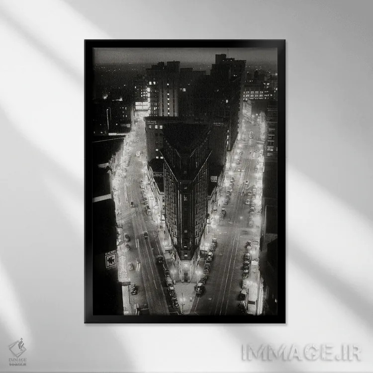 تابلو دکوراتیو نمای شب از بالا بر تقاطع خیابان براد و پیچ تری و ساختمان م… اثر تصاویر وینتج - نمای قابدار مشکی