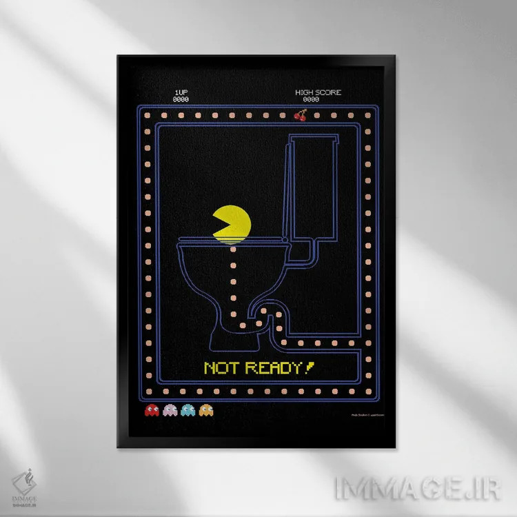 تابلو دکوراتیو پک من روی توالت اثر وایات دیزاین - نمای قابدار مشکی
