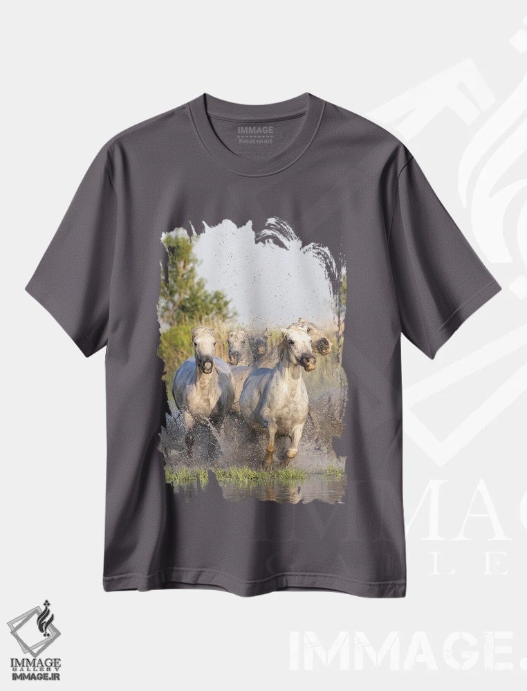 تیشرت طوسی طرح دار Provence-Alpes-Cote D'Azur, France. Horses Running Through The Marshes In The Camargue.,سنت-ماری-دو-لامر، پروانس-آلپ-کوت دازور، فرانسه. اسب ها در حال دویدن در باتلاق های کامارگ. اثر امیلی ام ویلسون
