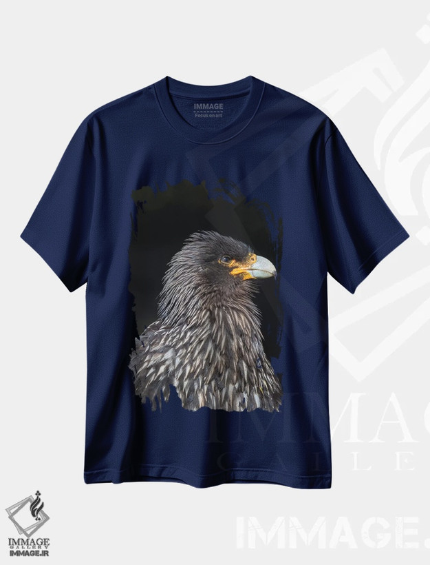 تیشرت سرمه ای طرح حیوانات ,protected and highly intelligent bird of prey. Falkland Islands,کاراکارای فالکلند یا جانی رووک، پرنده شکاری حفاظت شده و بسیار باهوش. جزایر فالکلند اثر مارتین زویک