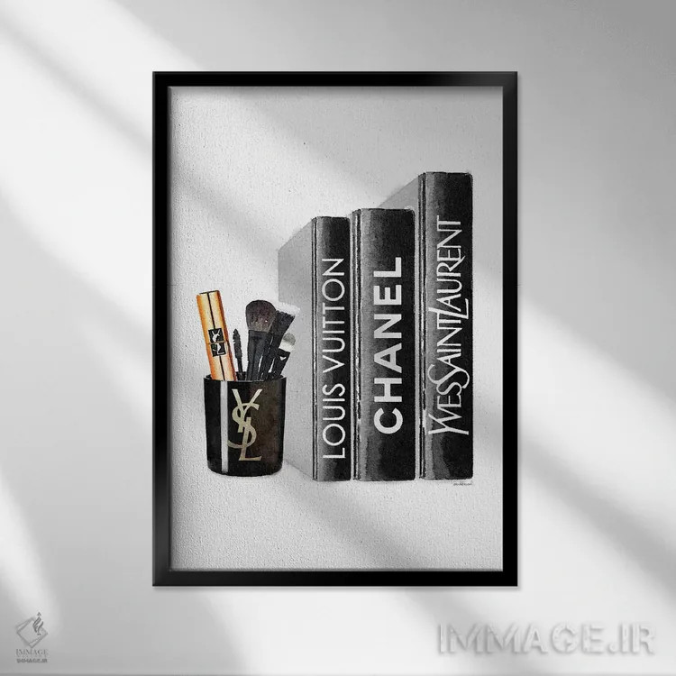 تابلو دکوراتیو کتاب ها با شمع YSL و براش ها اثر آماندا گرینوود - نمای قابدار مشکی