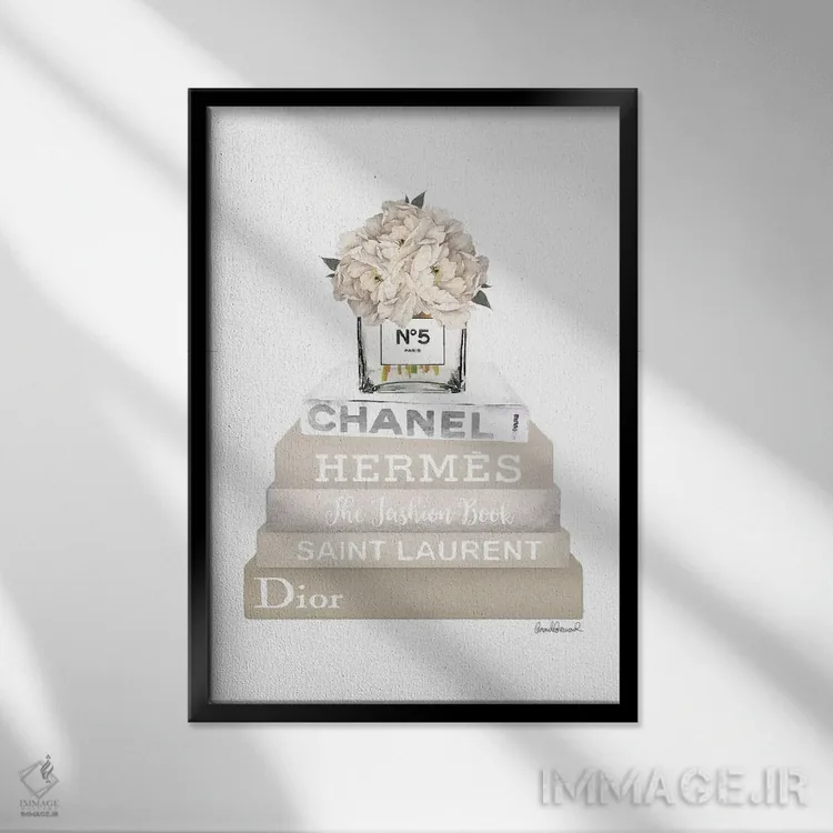 تابلو دکوراتیو Champagne, And Silver Bookstack Topped By Vase With Whit… اثر آماندا گرینوود - نمای قابدار مشکی