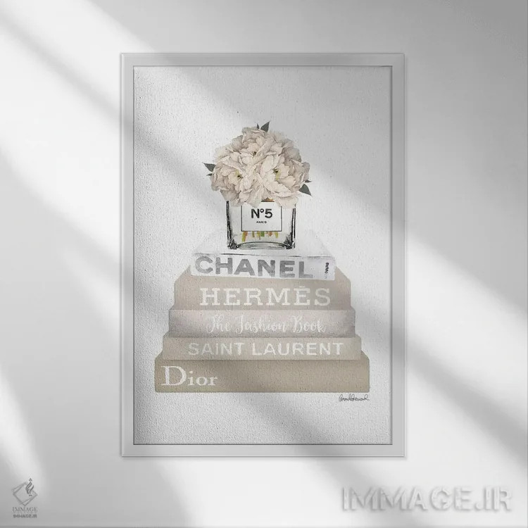 تابلو دکوراتیو Champagne, And Silver Bookstack Topped By Vase With Whit… اثر آماندا گرینوود - نمای قابدار سفید