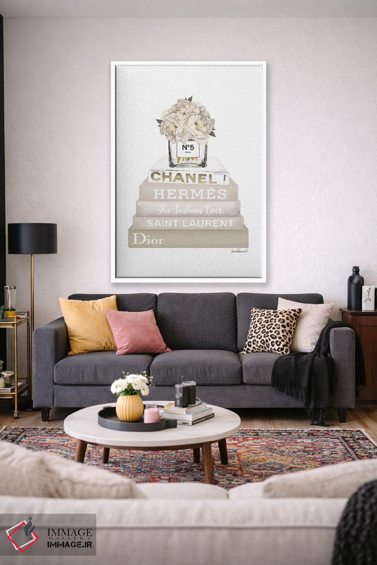 تابلو دکوراتیو Champagne, And Gold Bookstack Topped By Vase With White… اثر آماندا گرینوود - D1W